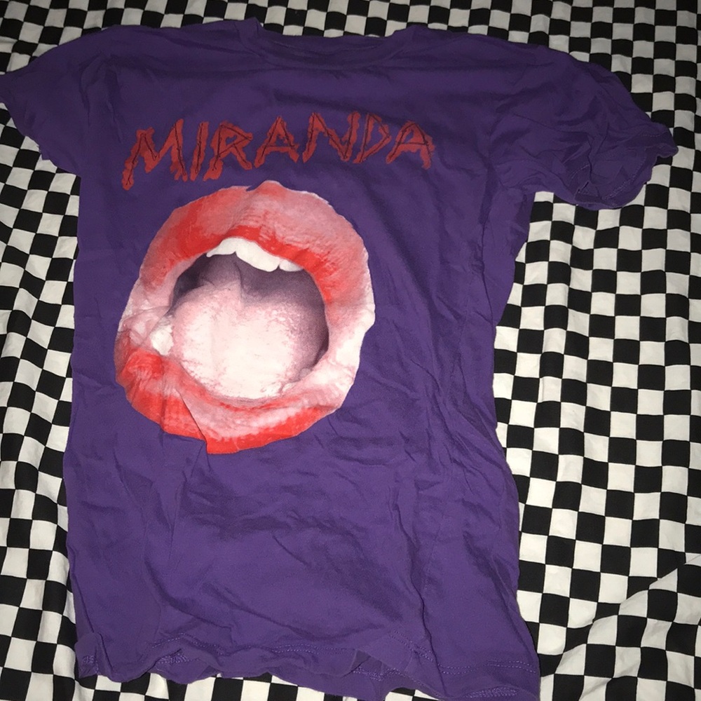 Miranda sings purple shirt